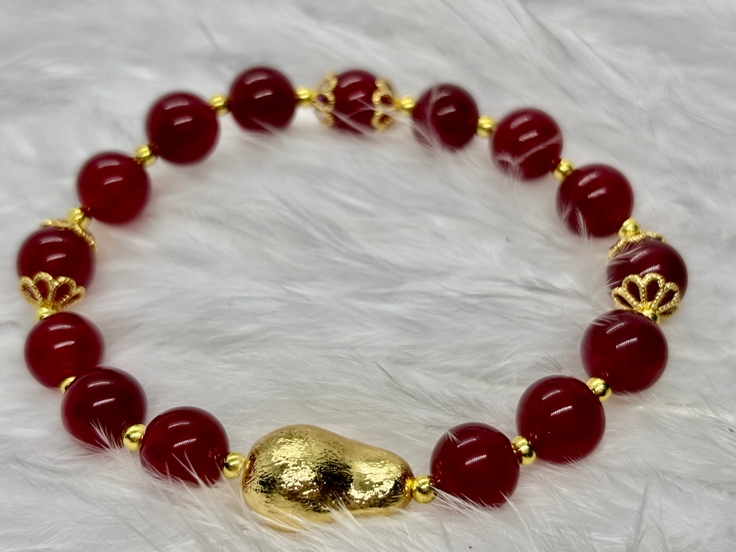 Natural Red Jade is the stone of vitality, courage, and passion