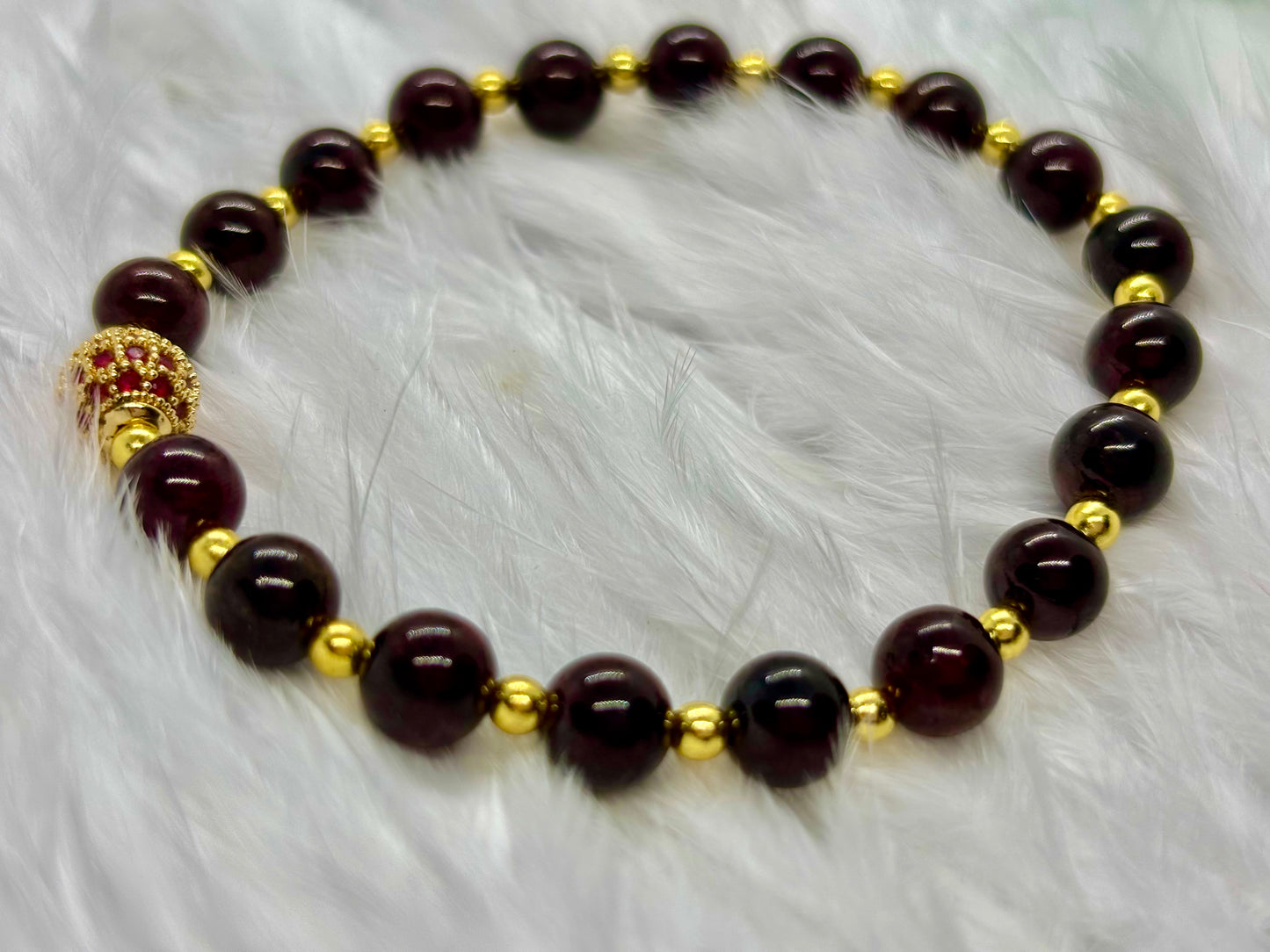 Garnet is the flame of life itself — a stone of passion, power, and renewal
