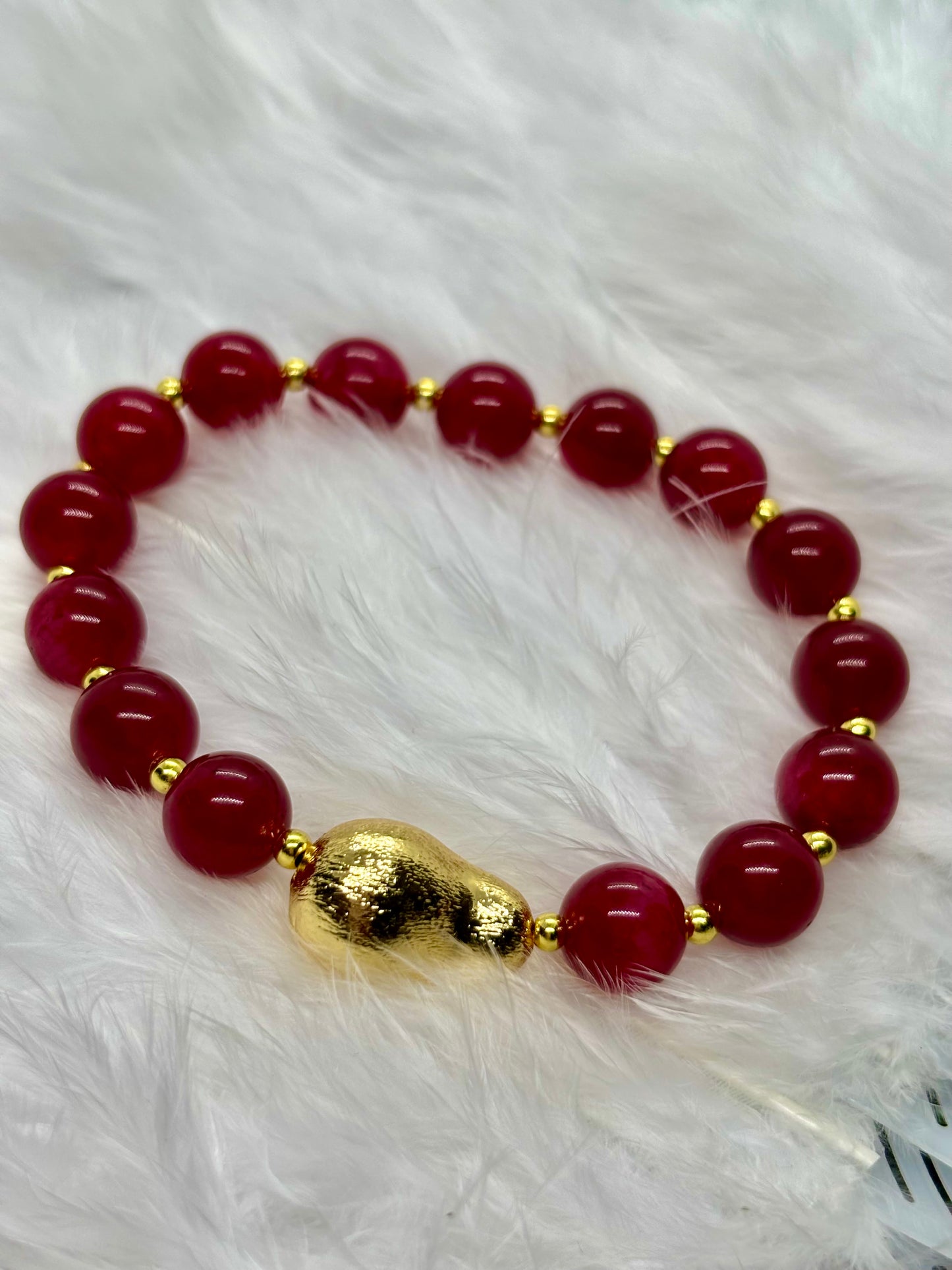 Natural Red Jade is the stone of vitality, courage, and passion