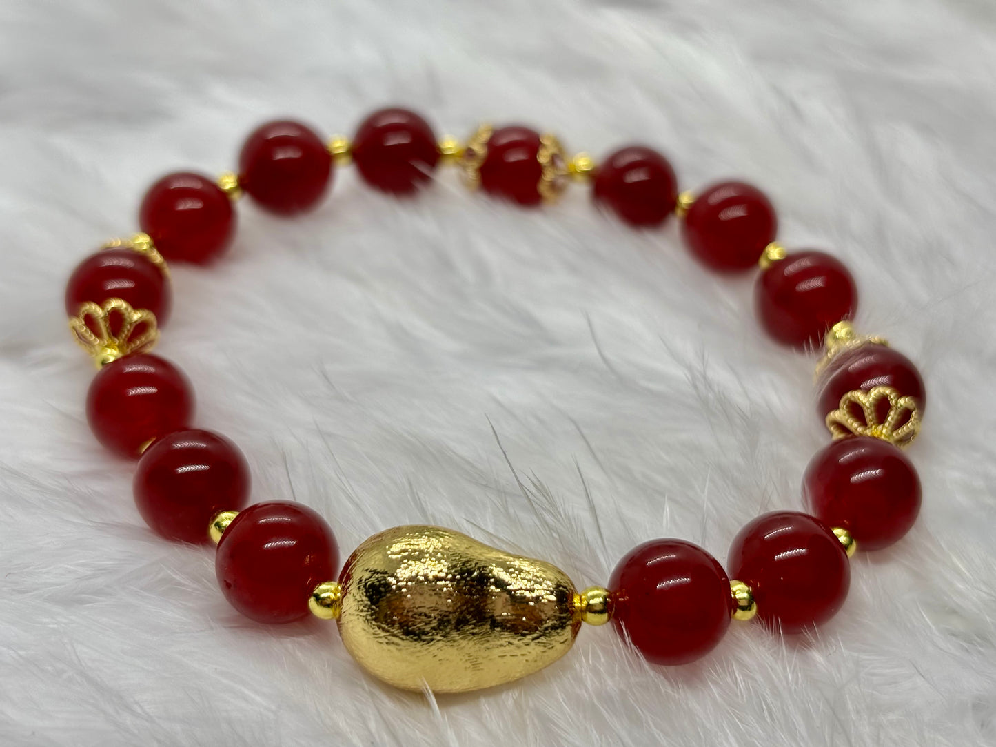 Natural Red Jade is the stone of vitality, courage, and passion