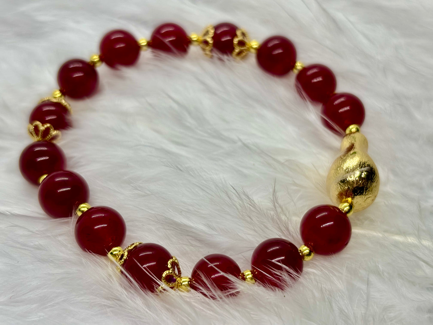 Natural Red Jade is the stone of vitality, courage, and passion