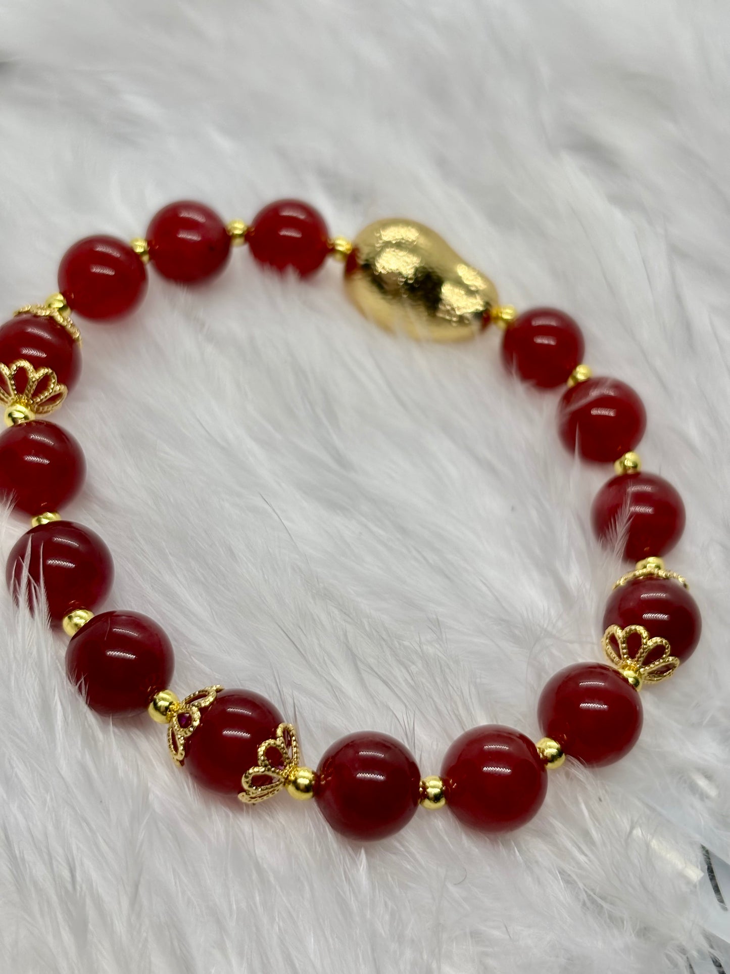 Natural Red Jade is the stone of vitality, courage, and passion