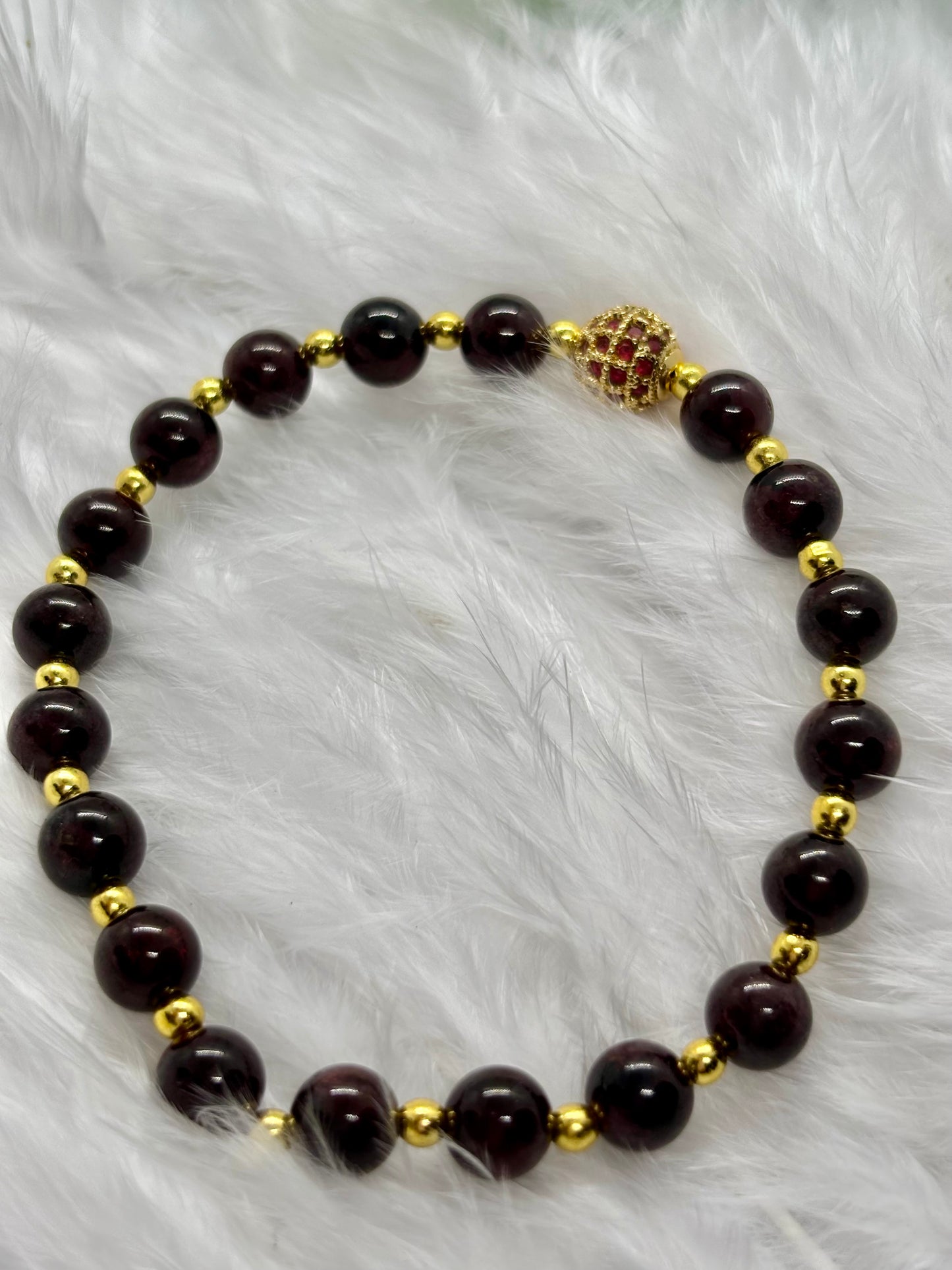 Garnet is the flame of life itself — a stone of passion, power, and renewal