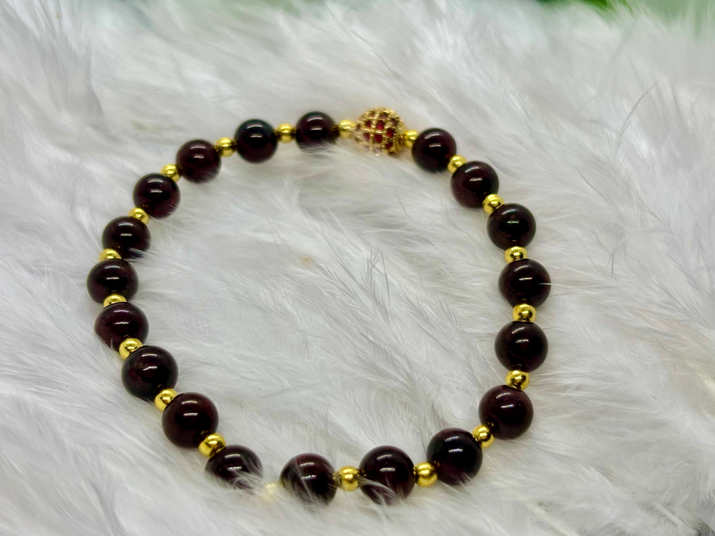 Garnet is the flame of life itself — a stone of passion, power, and renewal