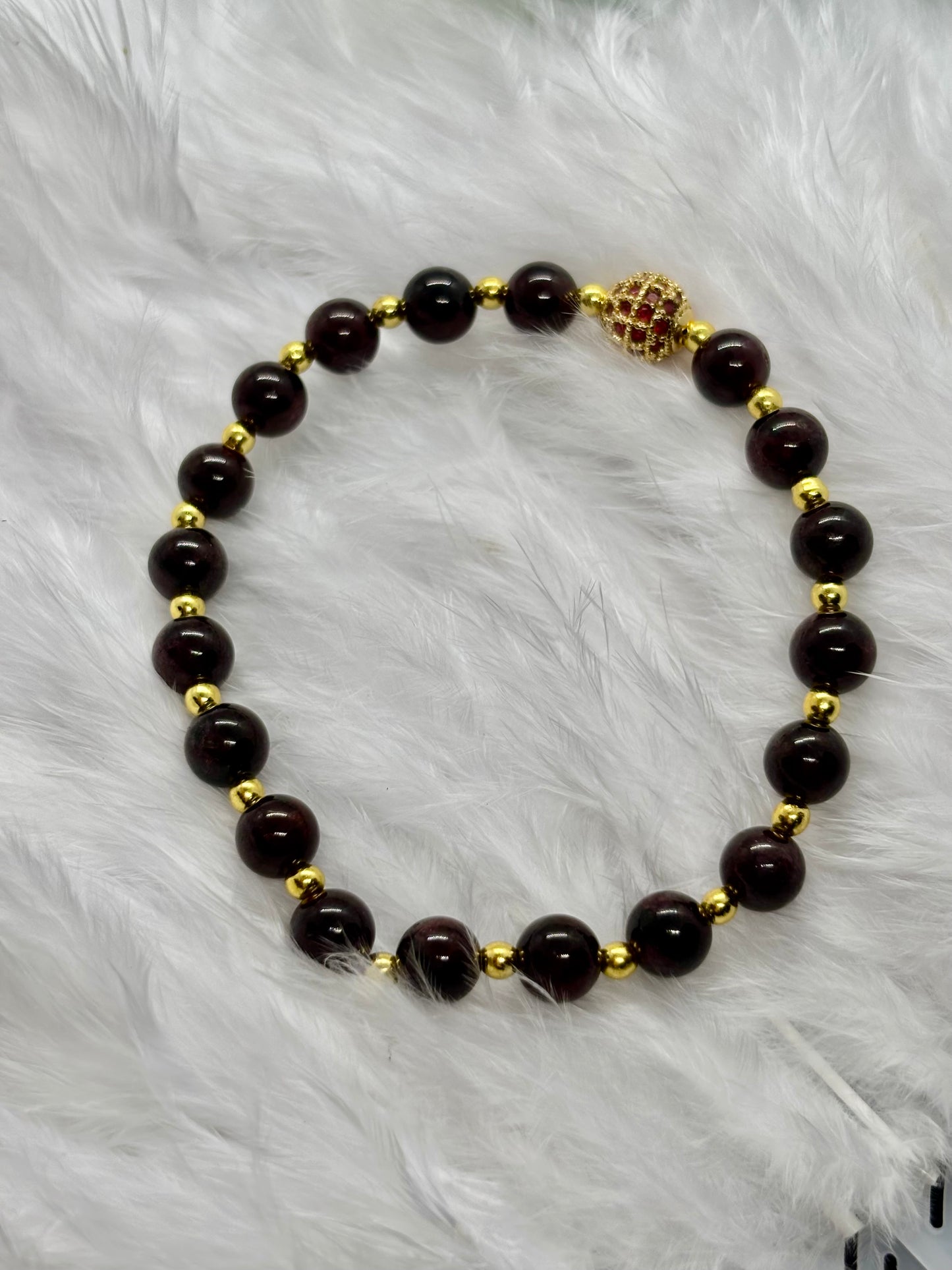 Garnet is the flame of life itself — a stone of passion, power, and renewal