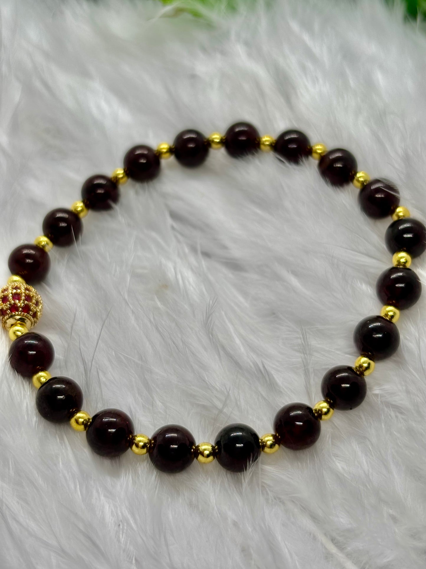 Garnet is the flame of life itself — a stone of passion, power, and renewal