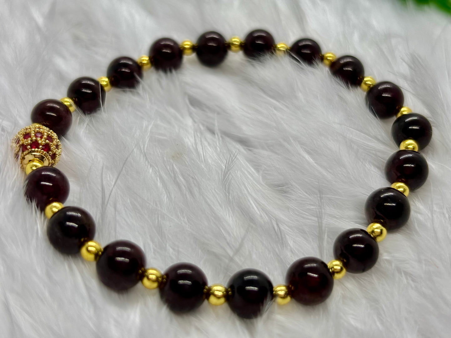 Garnet is the flame of life itself — a stone of passion, power, and renewal